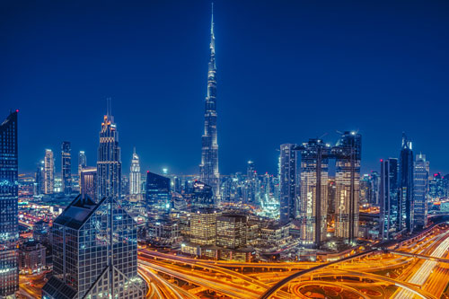 Downtown Dubai skyline at night (Photo © ZQ Lee / Unsplash)